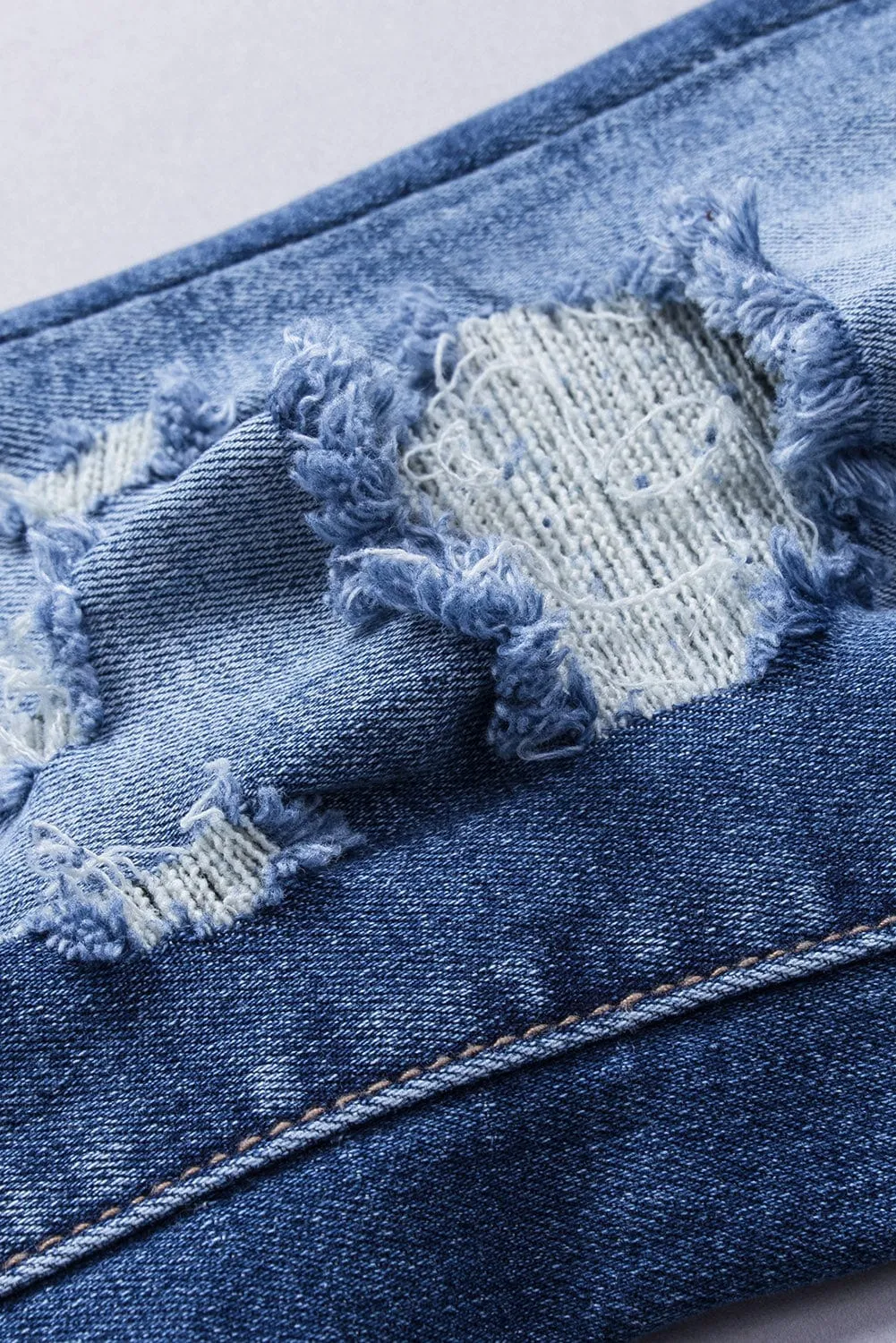 Blue Denim Flared Distressed Jeans